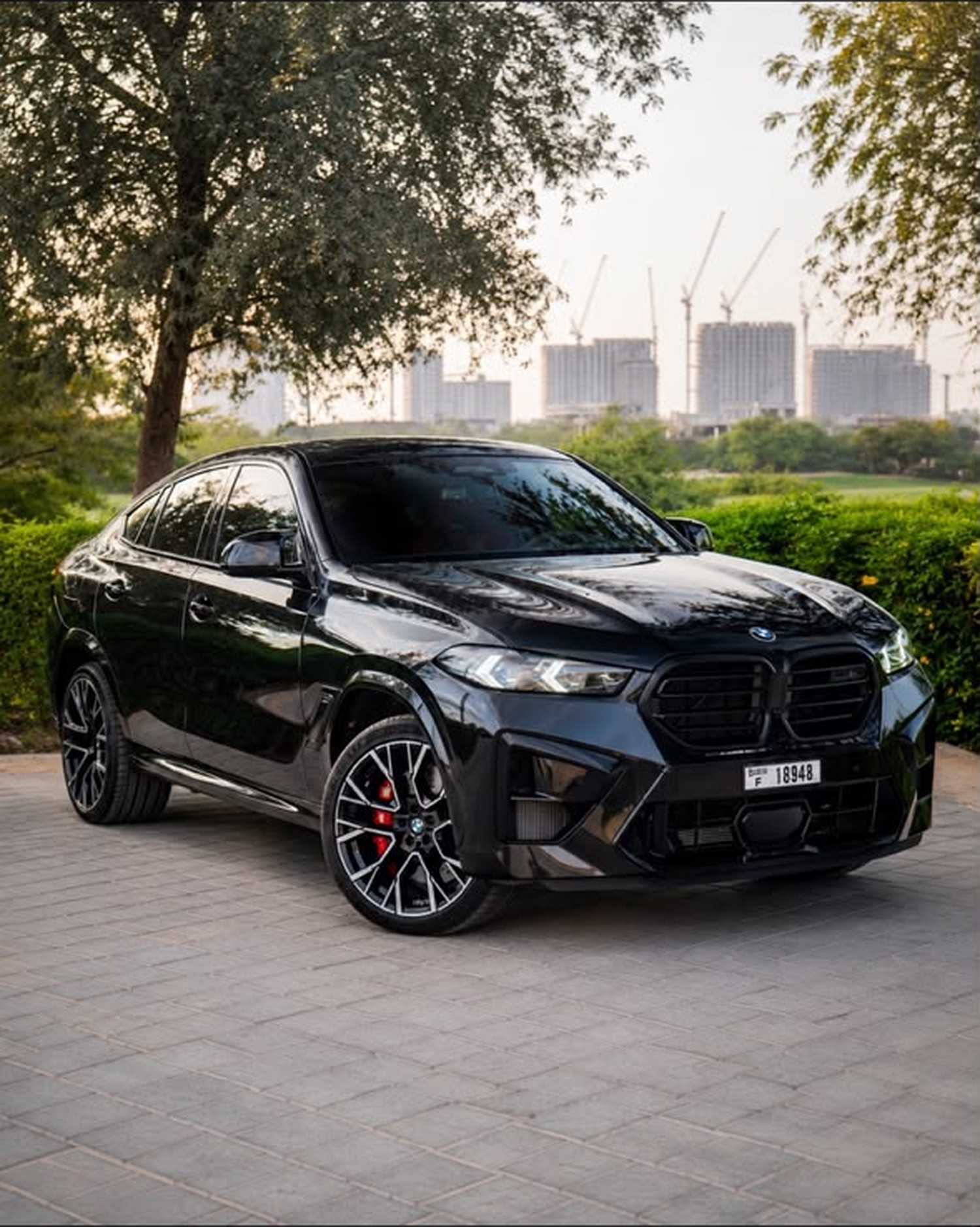 BMW X6 M Competition – Black Sapphire – Red Merino
